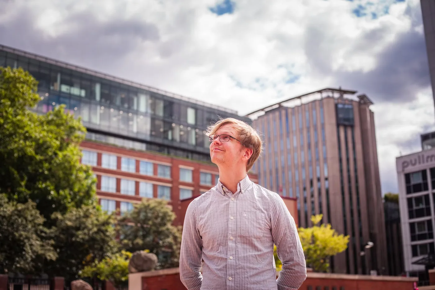 Nat Hawley standing outside office buildings